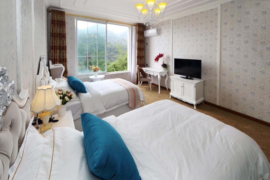 לשאן Panshan Tingquan Tuwo Holiday Resort חדר תמונה