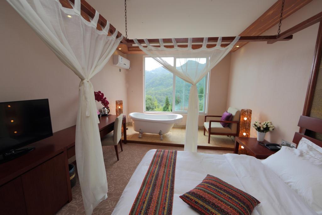 לשאן Panshan Tingquan Tuwo Holiday Resort חדר תמונה