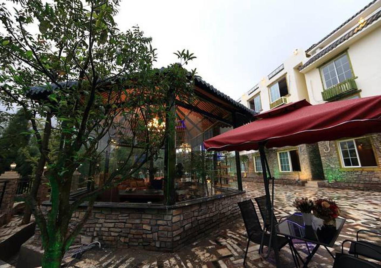 לשאן Panshan Tingquan Tuwo Holiday Resort מראה חיצוני תמונה